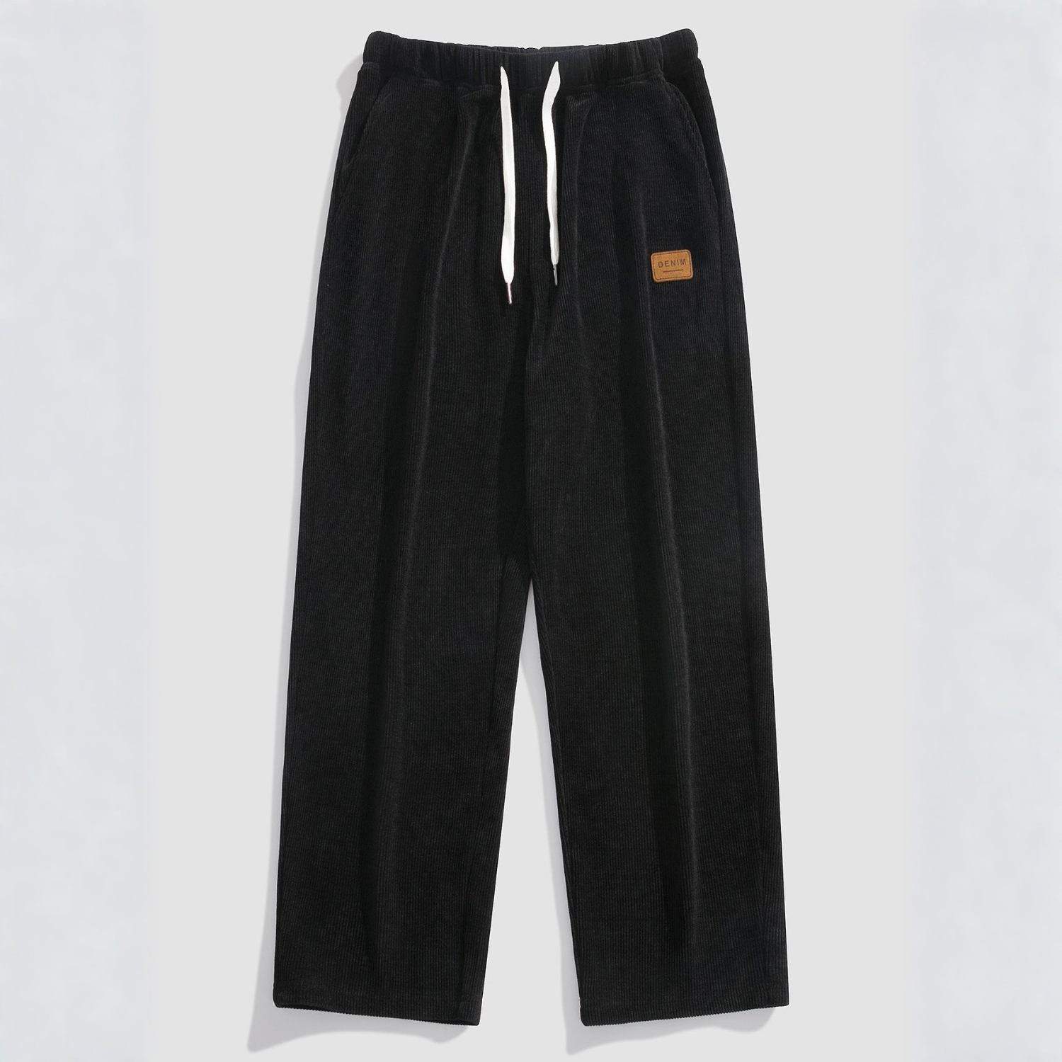 Men's straight fit corduroy pants in warm neutral tones with textured finish for autumn winter