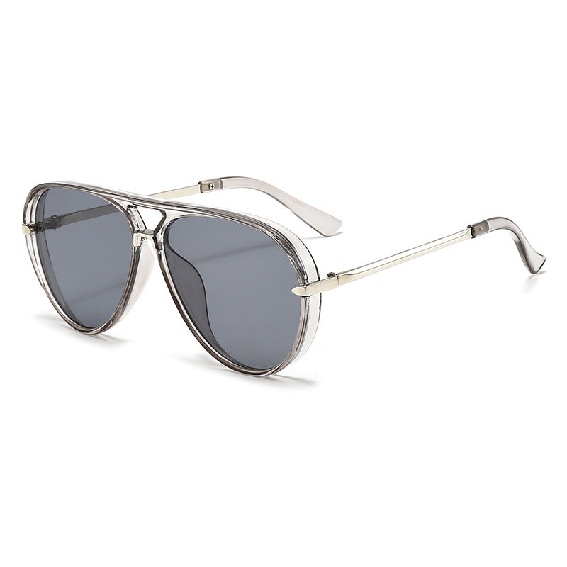 Vintage 70s aviator sunglasses with gradient lenses, gold-tone arms, and sculpted acetate frames