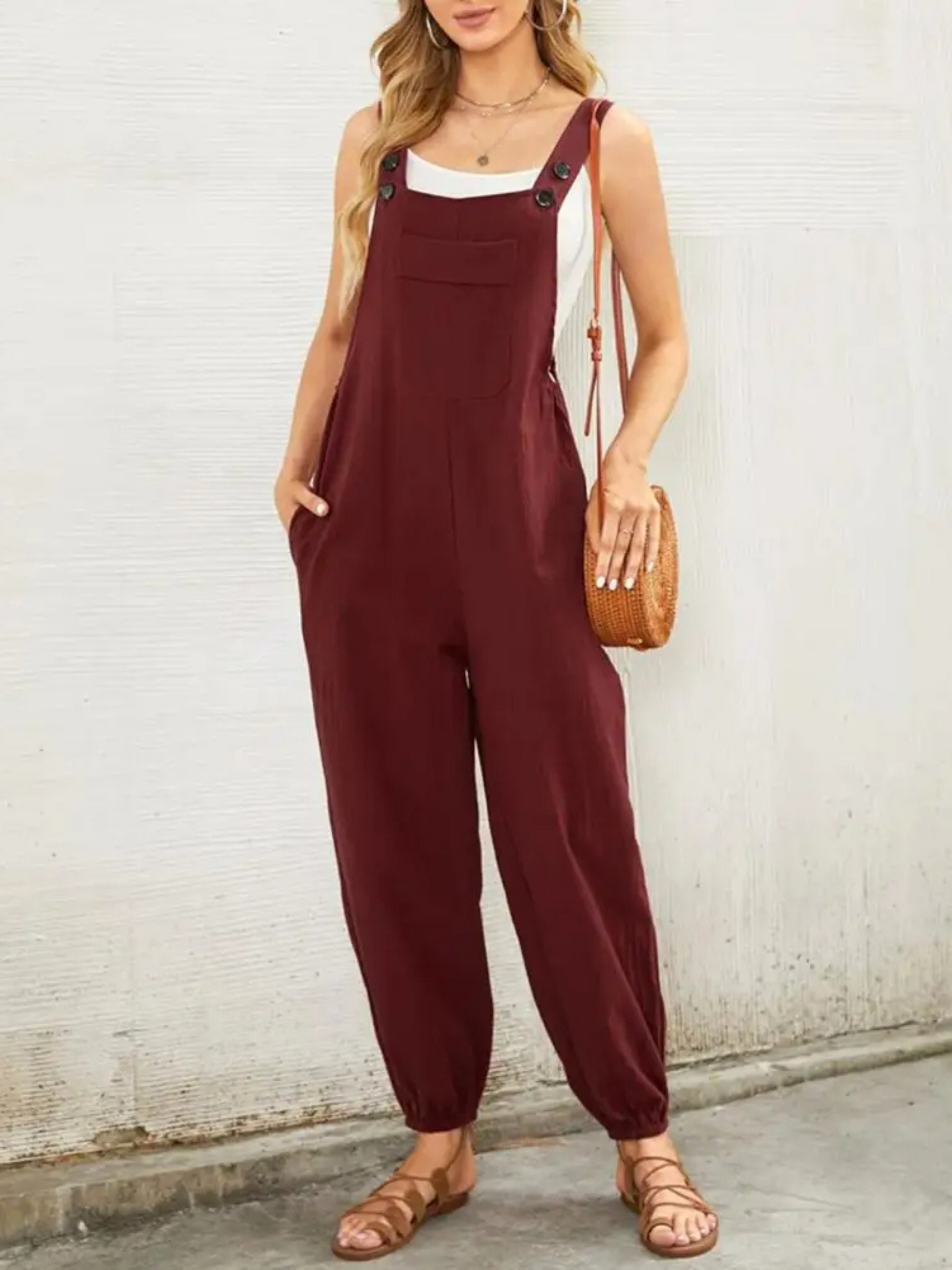 Women's relaxed-fit cotton-blend overall jumpsuit in neutral tone with fluid draped silhouette