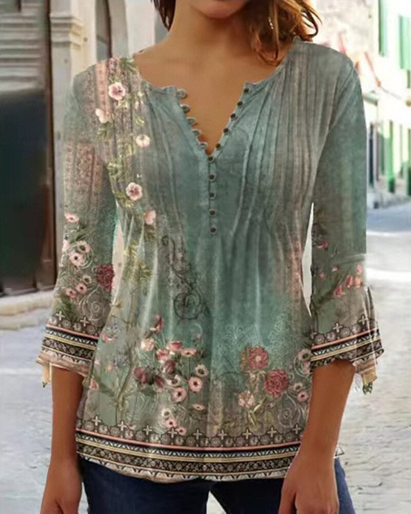 Women's ivory scalloped V-neck blouse with flowing pleats and front button detail