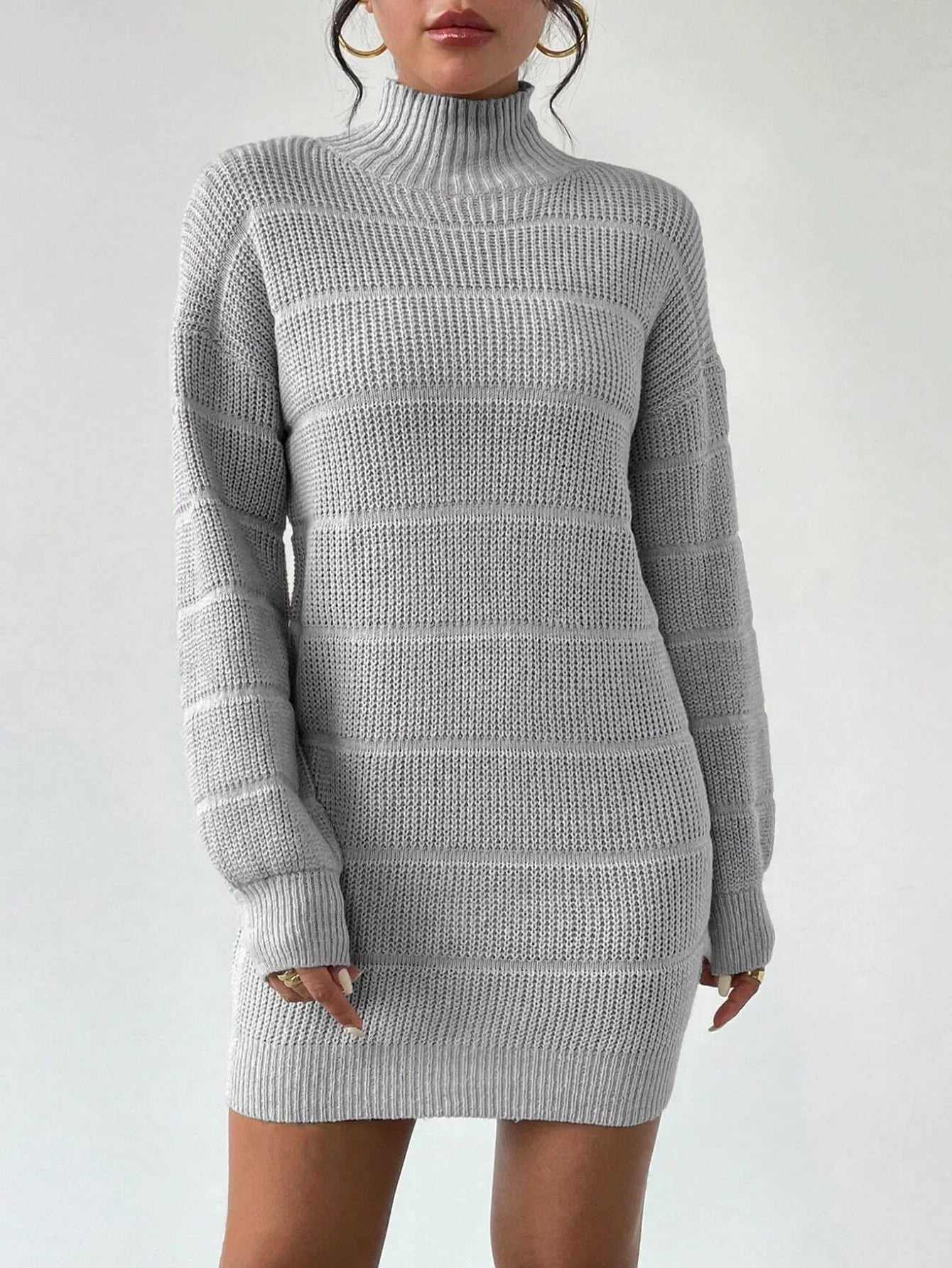 Women's ribbed-knit turtleneck mini dress with bold texture and structured sculpted silhouette