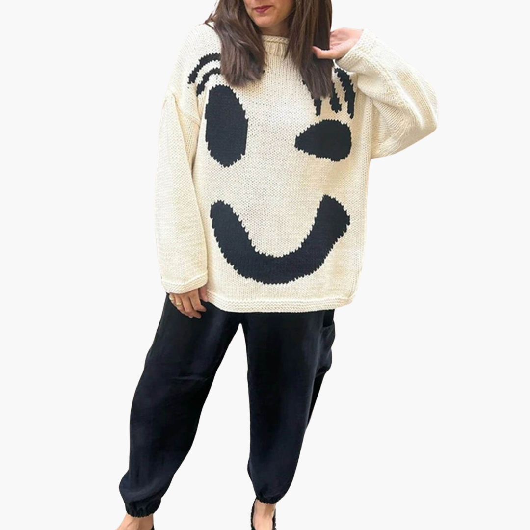 Women's oversized knitted sweater cozy casual knitwear with playful smiley motif design