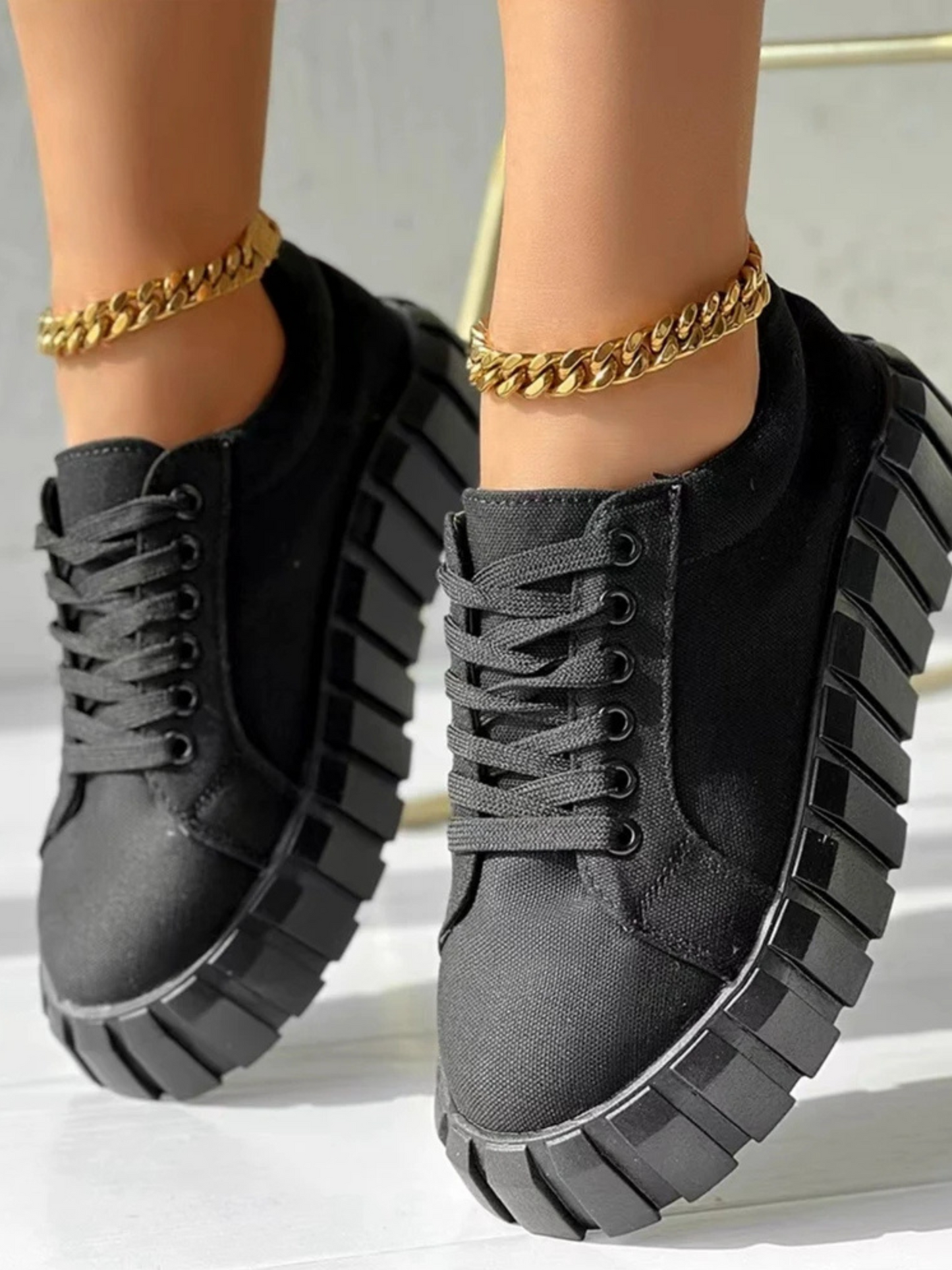 White platform sneaker breathable canvas upper oversized sculpted sole urban street style