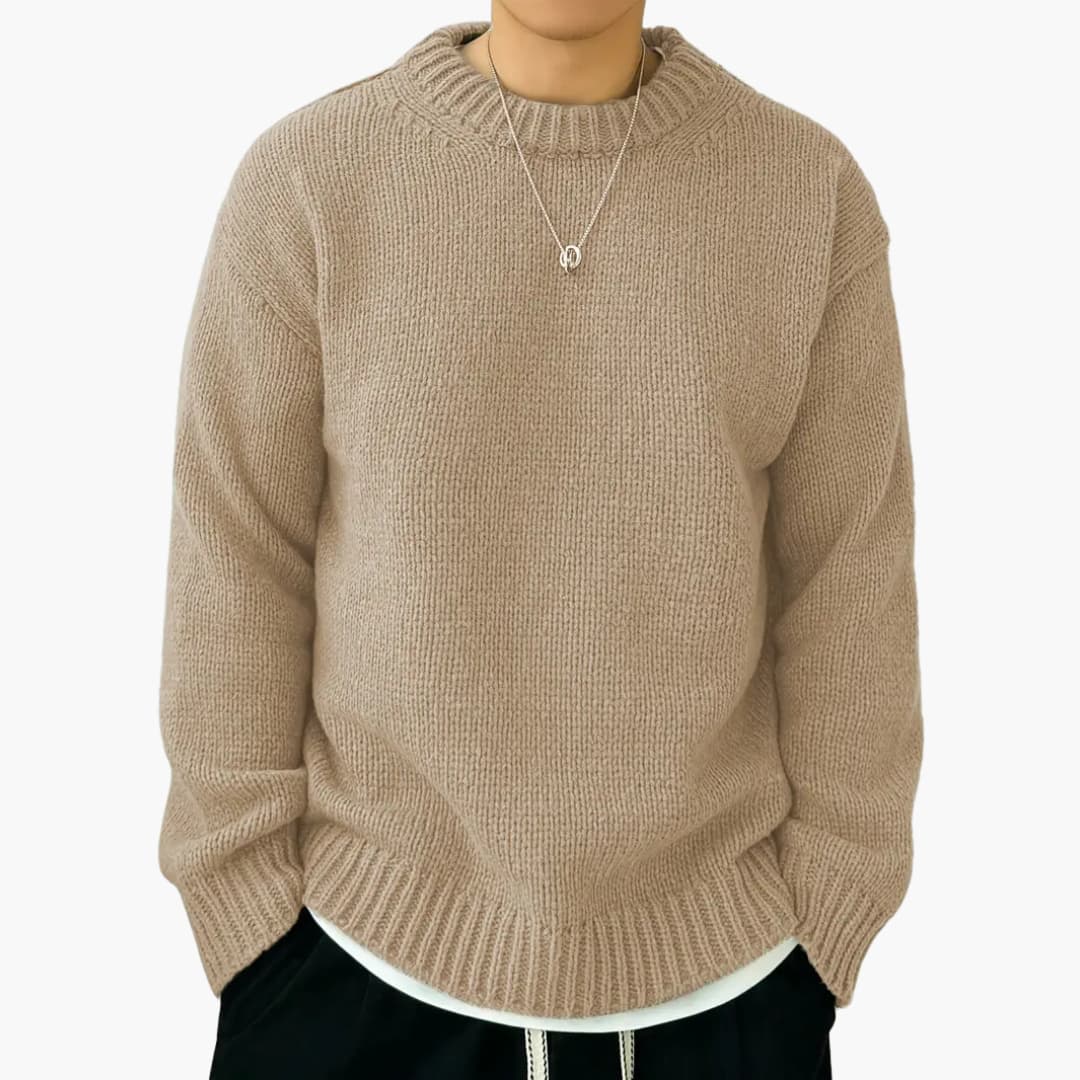 Elegant beige knitted sweater relaxed fit cozy ribbed texture versatile everyday style