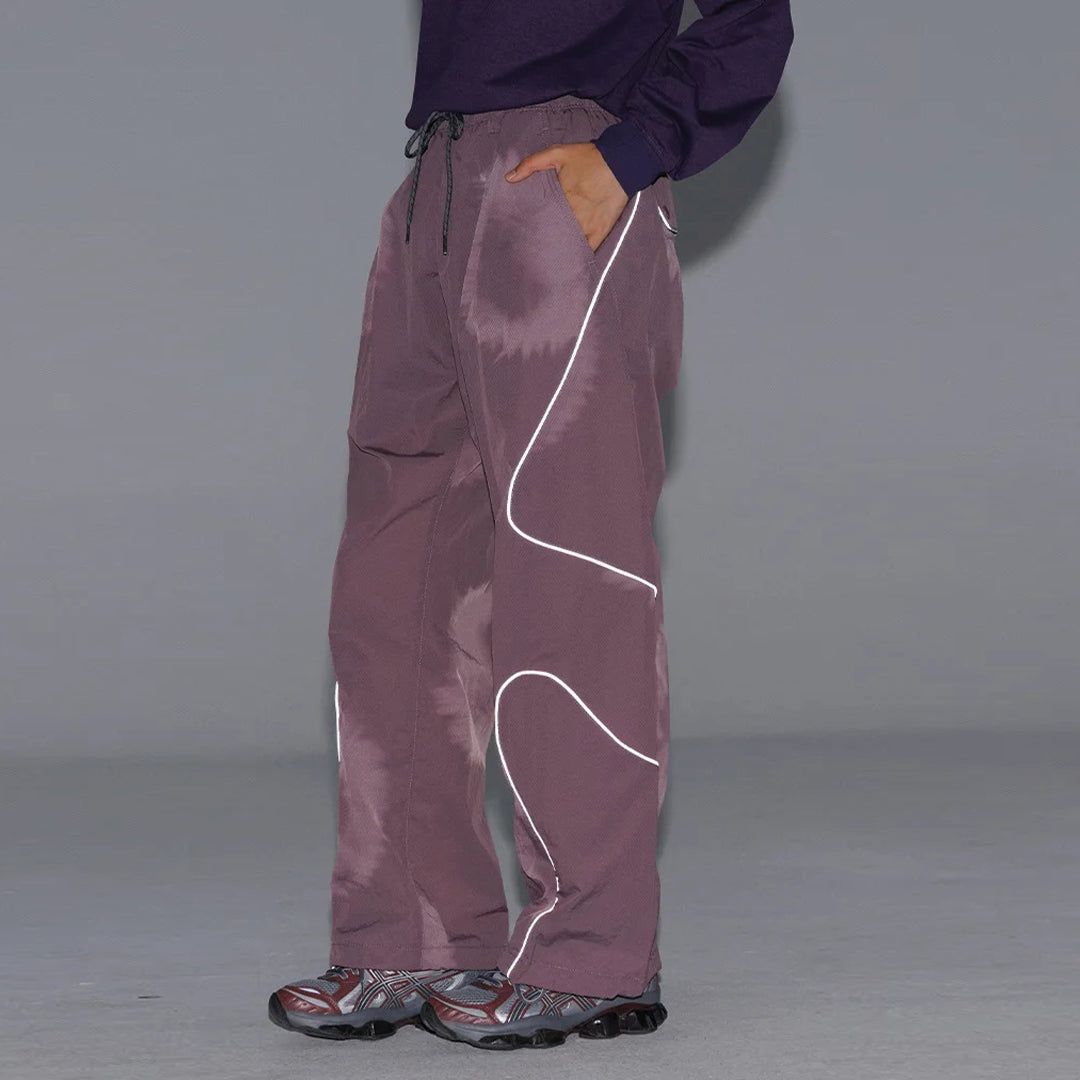 Black quick-dry nylon running trousers with curved reflective stripes and drawstring waist