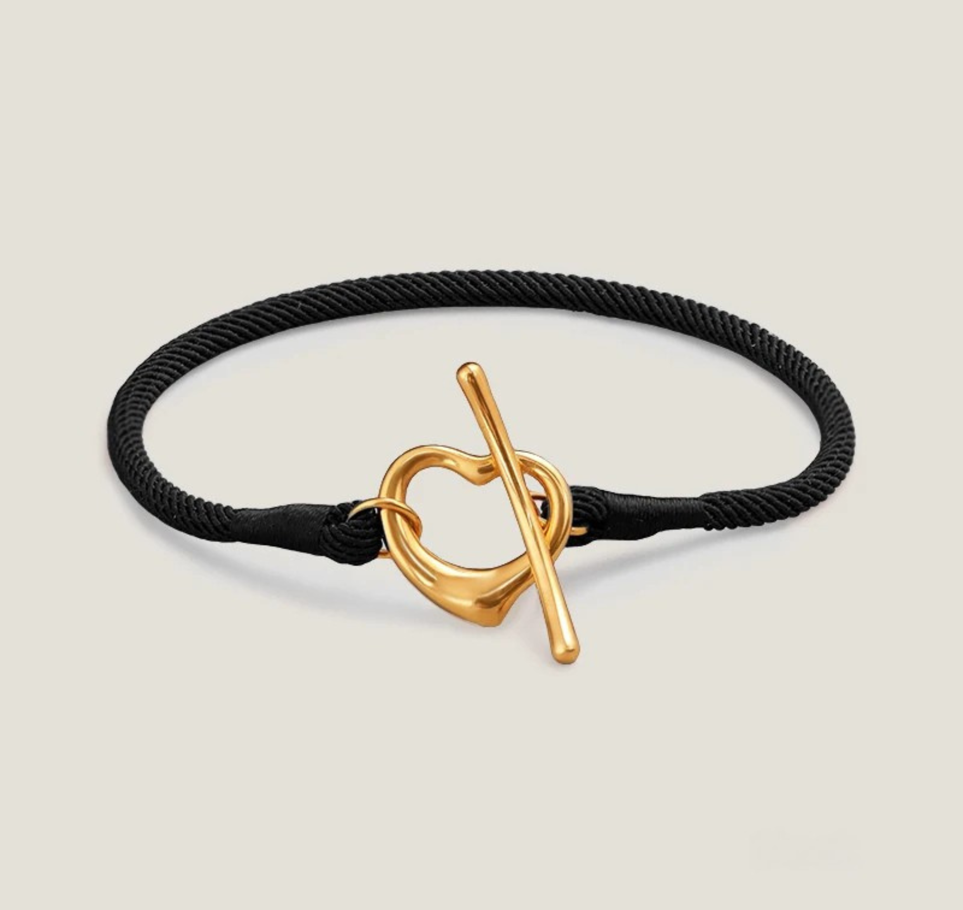 Gold-tone heart toggle rope bracelet adjustable minimalist woven cord tarnish-resistant everyday jewelry