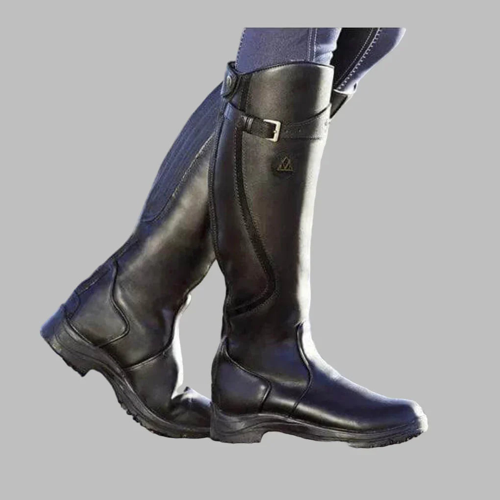 Women's rugged brown leather trekking boots with structured fit and durable all-terrain outsole