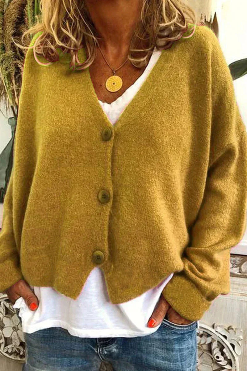 Women's cozy patchwork knit cardigan with V-neck, versatile layering piece in multicolor pattern