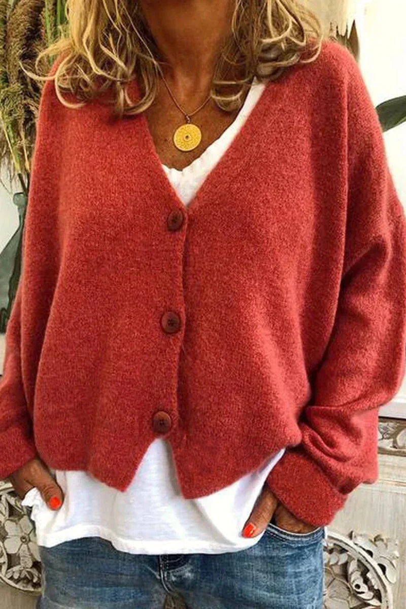 Women's cozy patchwork knit cardigan with V-neck, versatile layering piece in multicolor pattern