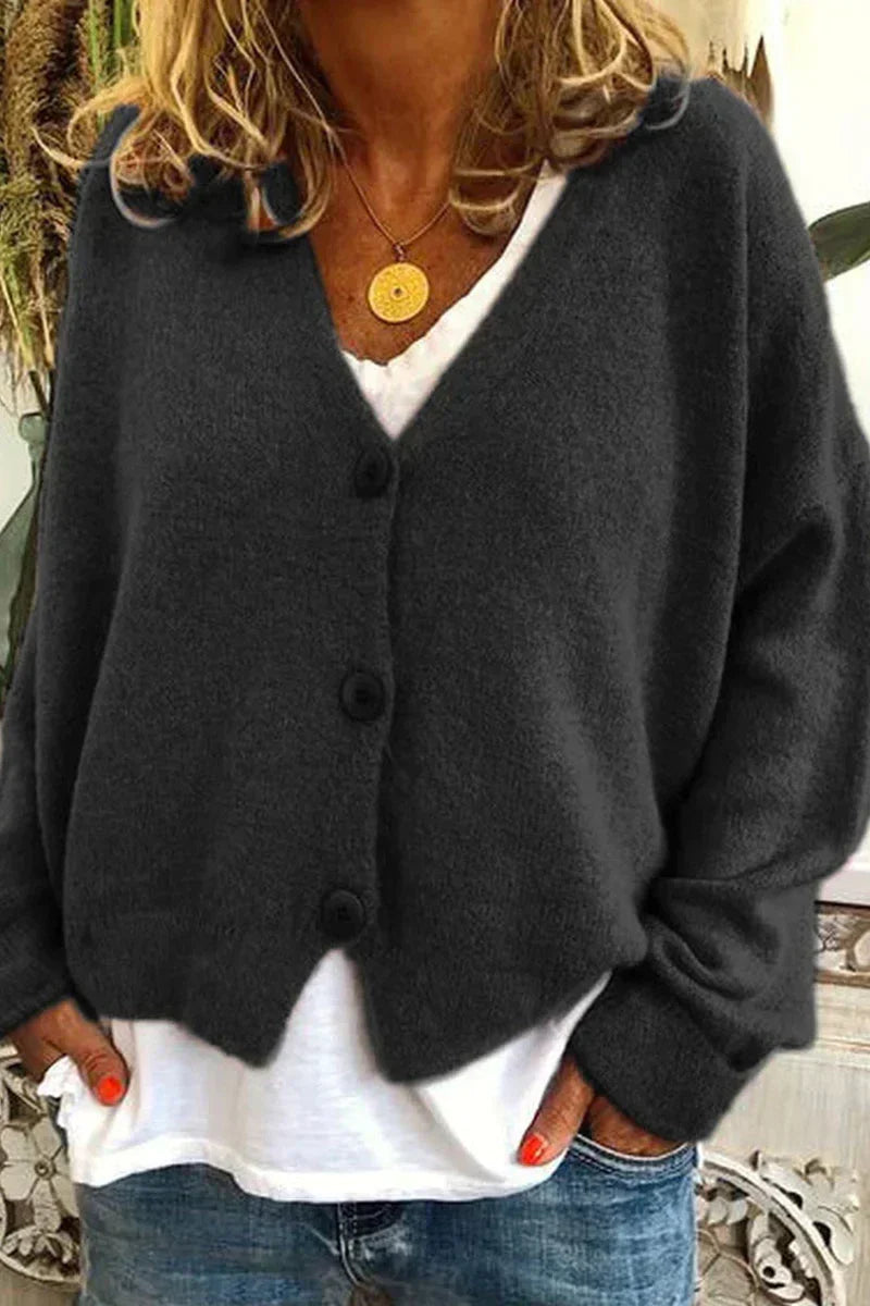 Women's patchwork knit cardigan cozy V-neck layering piece with subtle mixed-pattern design
