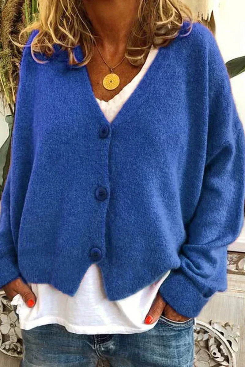 Women's cozy patchwork knit cardigan with V-neck, versatile layering piece in multicolor pattern