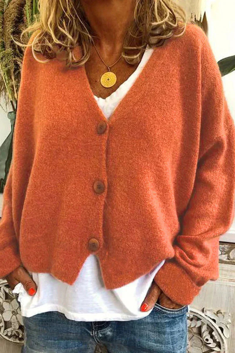 Women's cozy patchwork knit cardigan with V-neck, versatile layered style in multicolor design