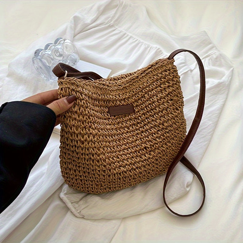 Women's compact braided saddle crossbody bag with long strap, stylish silhouette for city outings