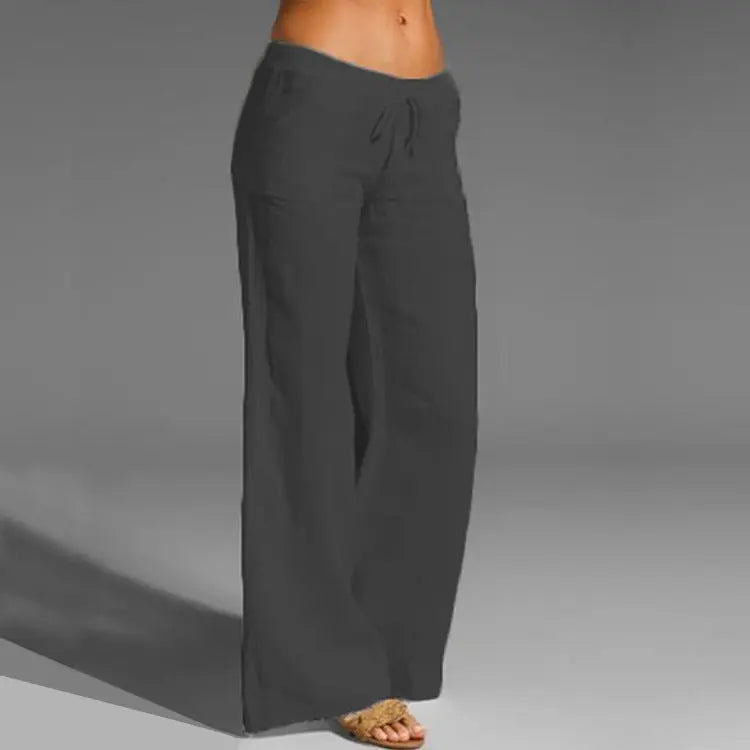 Women's beige linen relaxed-fit pants, lightweight breathable fabric, effortless chic summer style