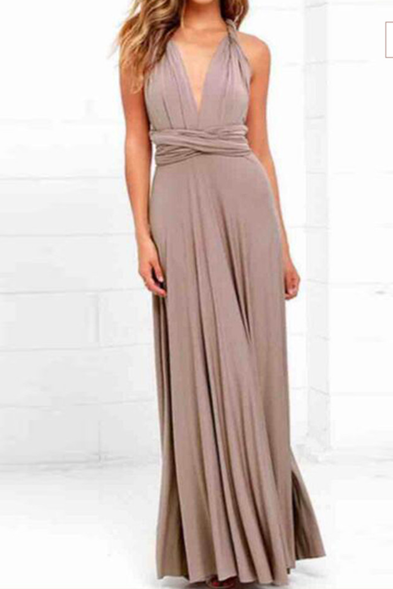 Women's floor-length halterneck A-line party dress with daring high slit for wedding evening glam