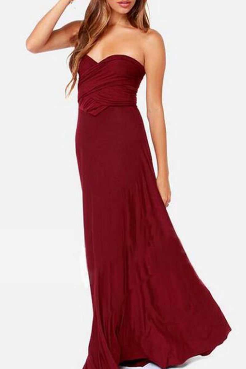 Women's floor-length halterneck A-line party dress with daring high slit for wedding evening glam