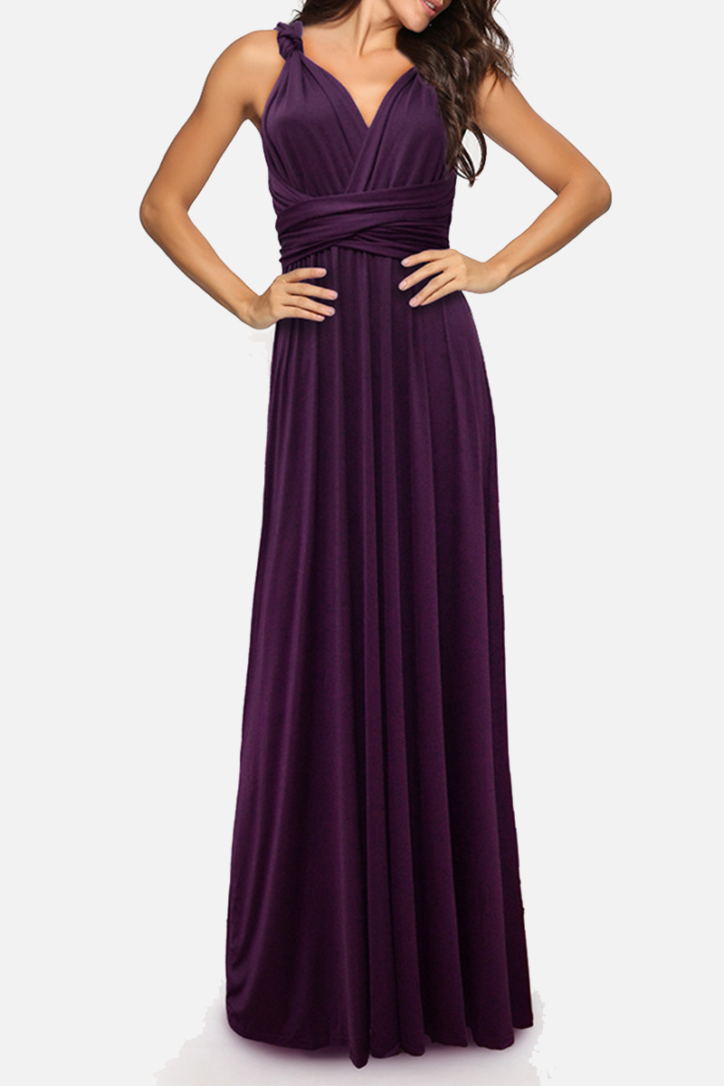 Women's floor-length halterneck A-line party dress with daring high slit for wedding evening glam
