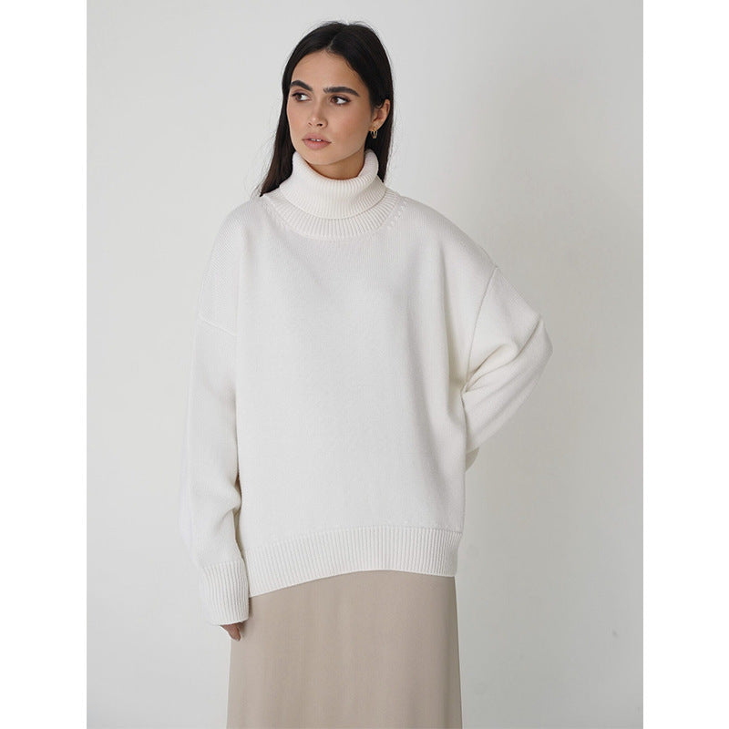 Women's vibrant green oversized turtleneck wool sweater with relaxed cozy knit silhouette