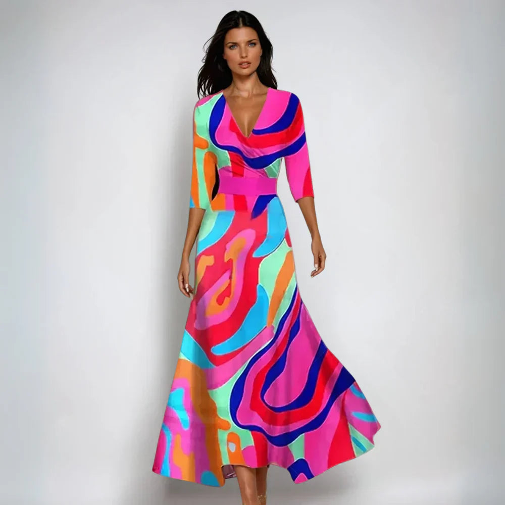Women's floral maxi wrap dress with fluid draping, V-neck, and bold allover print for elegant style