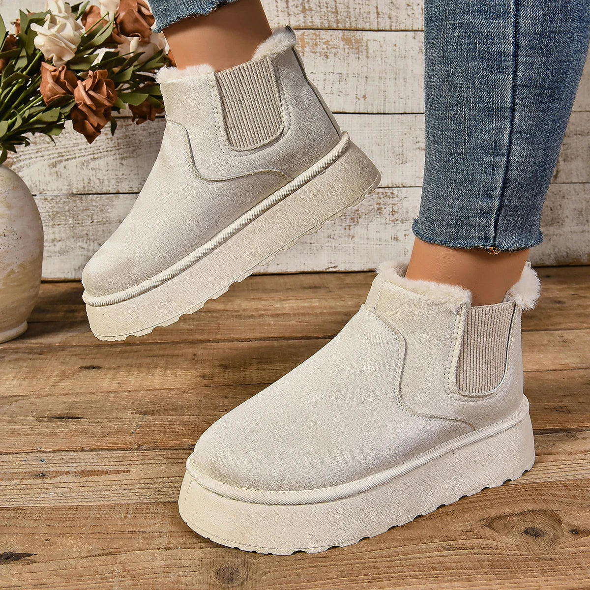 Women's black plush platform boots with faux fur lining, chunky sole, slip-on winter style
