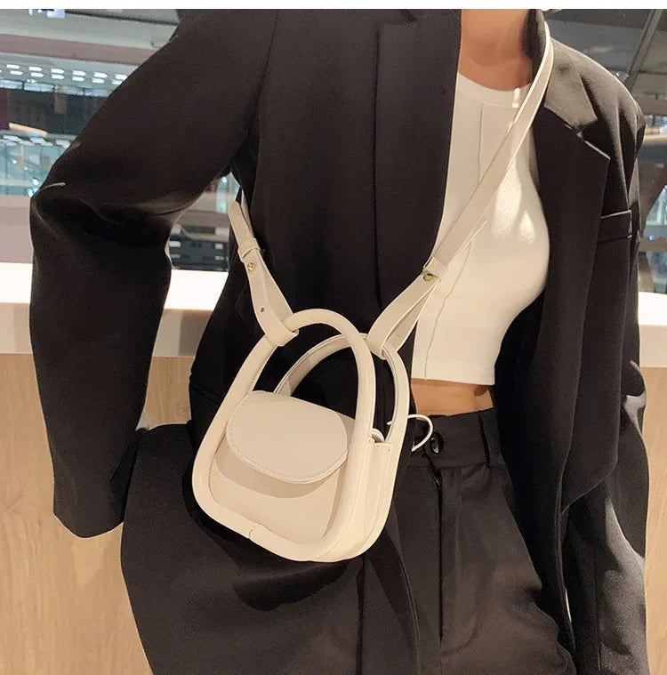 Élan mini satchel shoulder bag chic rounded silhouette curved handle compact women fashion