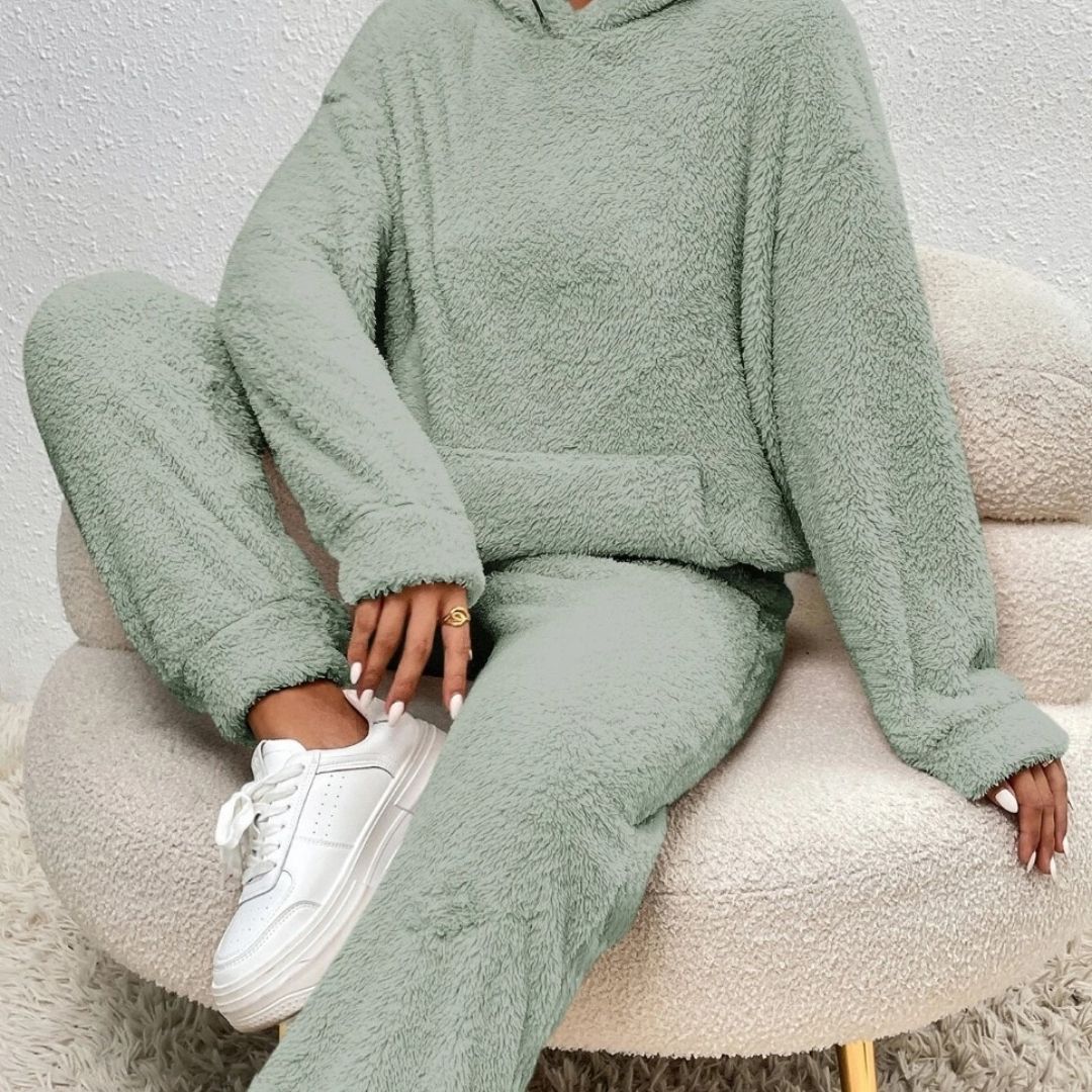 Women's spring two-piece hooded lounge set in cozy soft fabric with matching hoodie and pants flattering fit