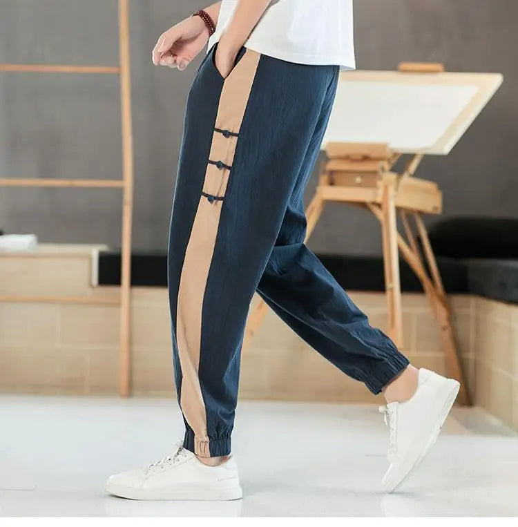 Men's lightweight track jogger pants relaxed fit with contrast side stripe and knot detail
