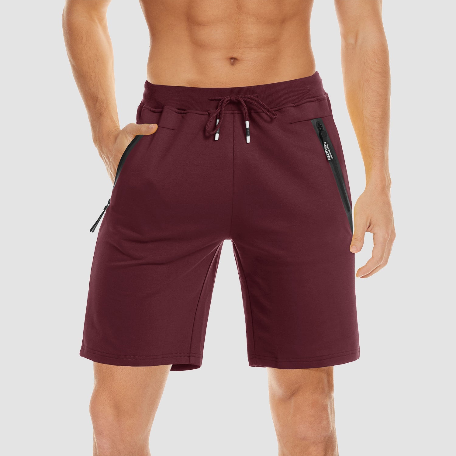Men's gray cotton jogger shorts with elastic drawstring waist and zipper pockets, quick-dry performance fit