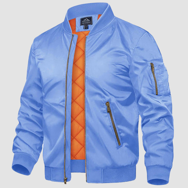 Men's black bomber jacket zip-up windbreaker with quilted orange interior lining and multi-pockets