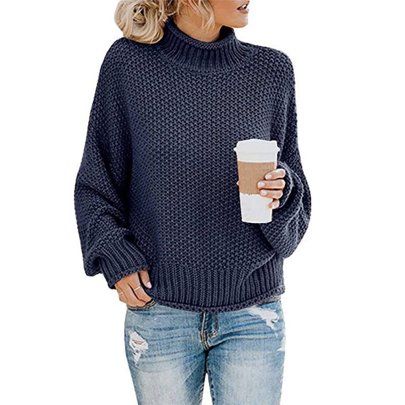 Women's chunky knit turtleneck sweater in neutral tone, oversized cozy fit with thick textured knit