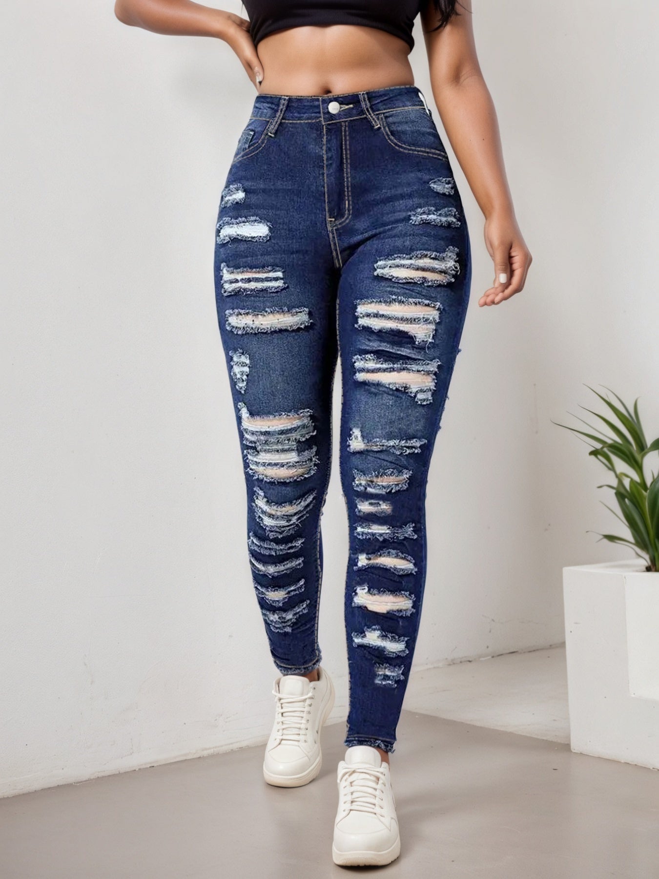 Women's blue ripped cropped slim fit jeans with high-stretch comfort and versatile all-day wear