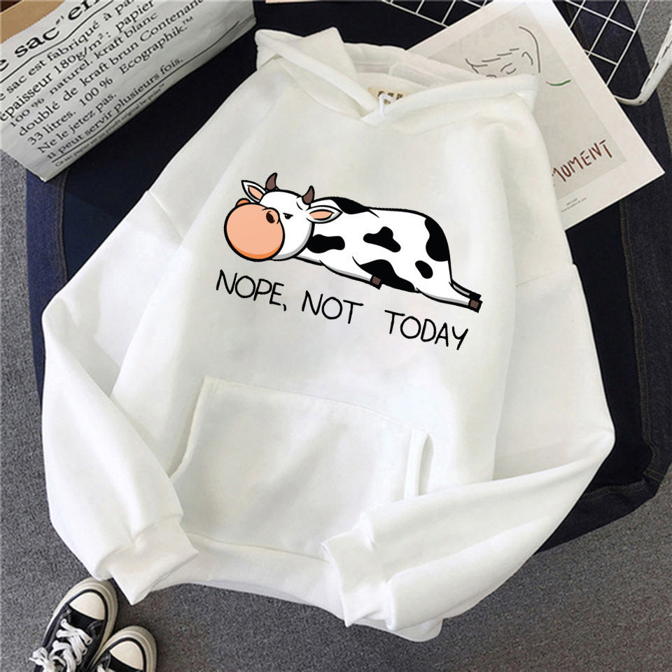 Women's relaxed fit hoodie with funny sleeping cow print and "Nope, Not Today" graphic, cozy casual style
