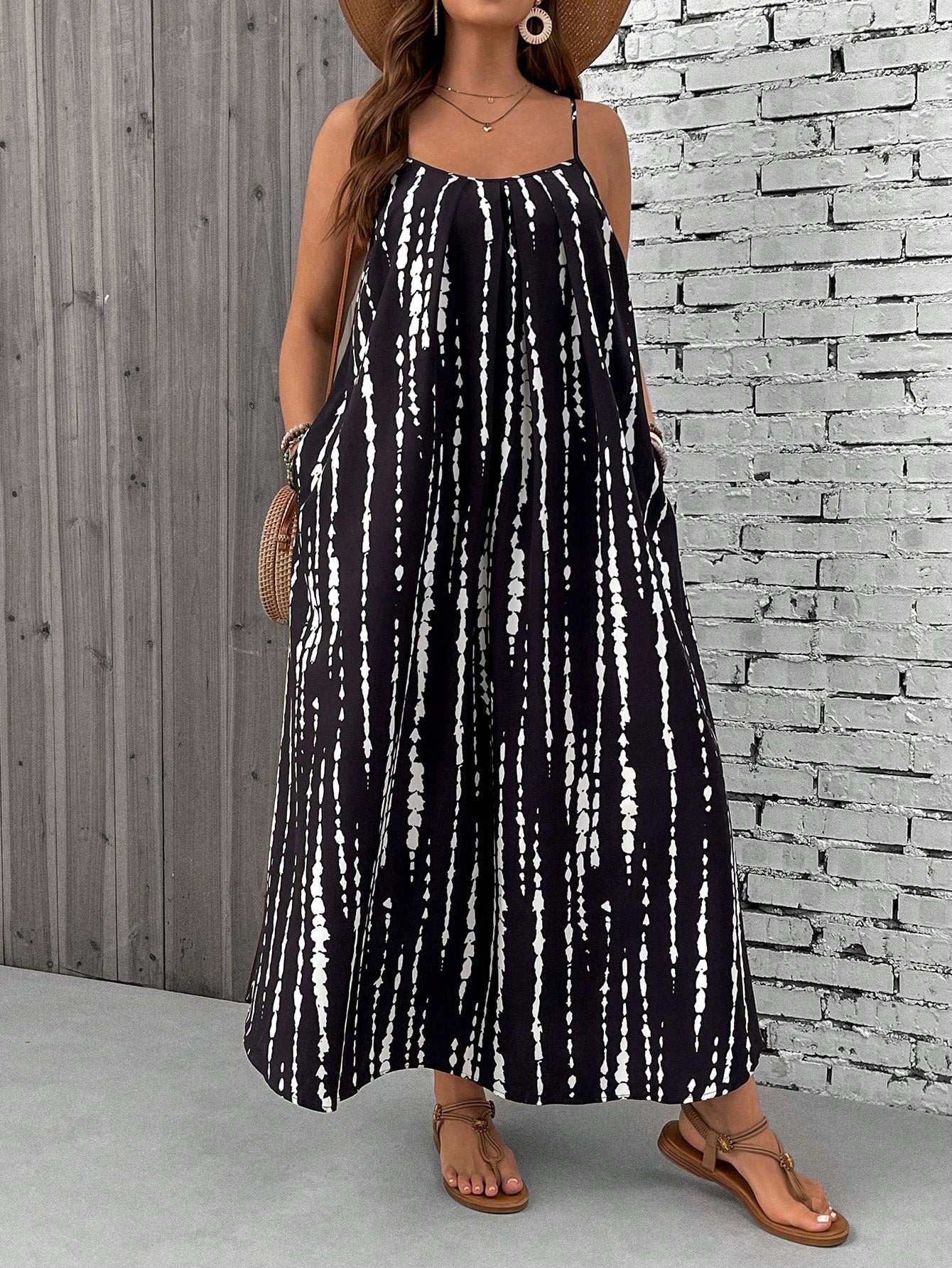 Paisley plus size boho maxi dress in flowing fit with spaghetti straps, ideal for beach outings