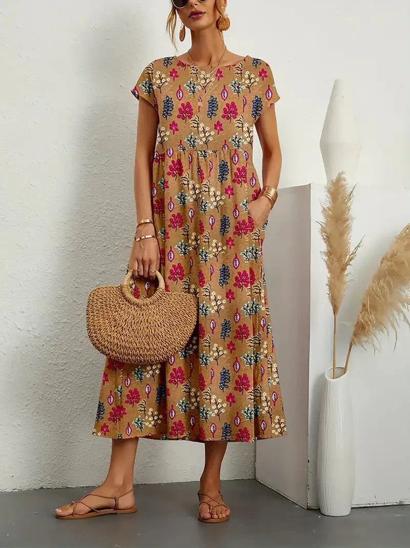 Boho midi dress with elastic waist, textured detailing, breezy silhouette and side pockets for women