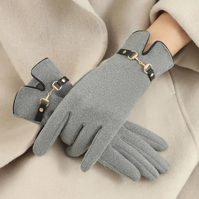 Black windproof touchscreen gloves with buckle detail, cozy warm interior for cold weather outdoor use