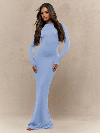 Women's black jersey maxi dress with long sleeves, round neck, and elegant fishtail hem silhouette