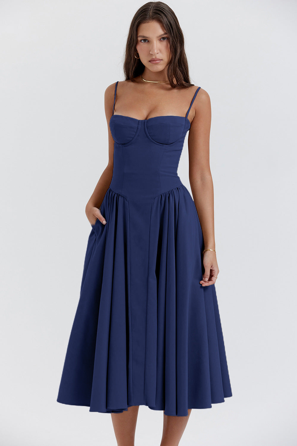 Natalie pleated midi dress slim straps structured bodice flared skirt hidden pockets spring elegant