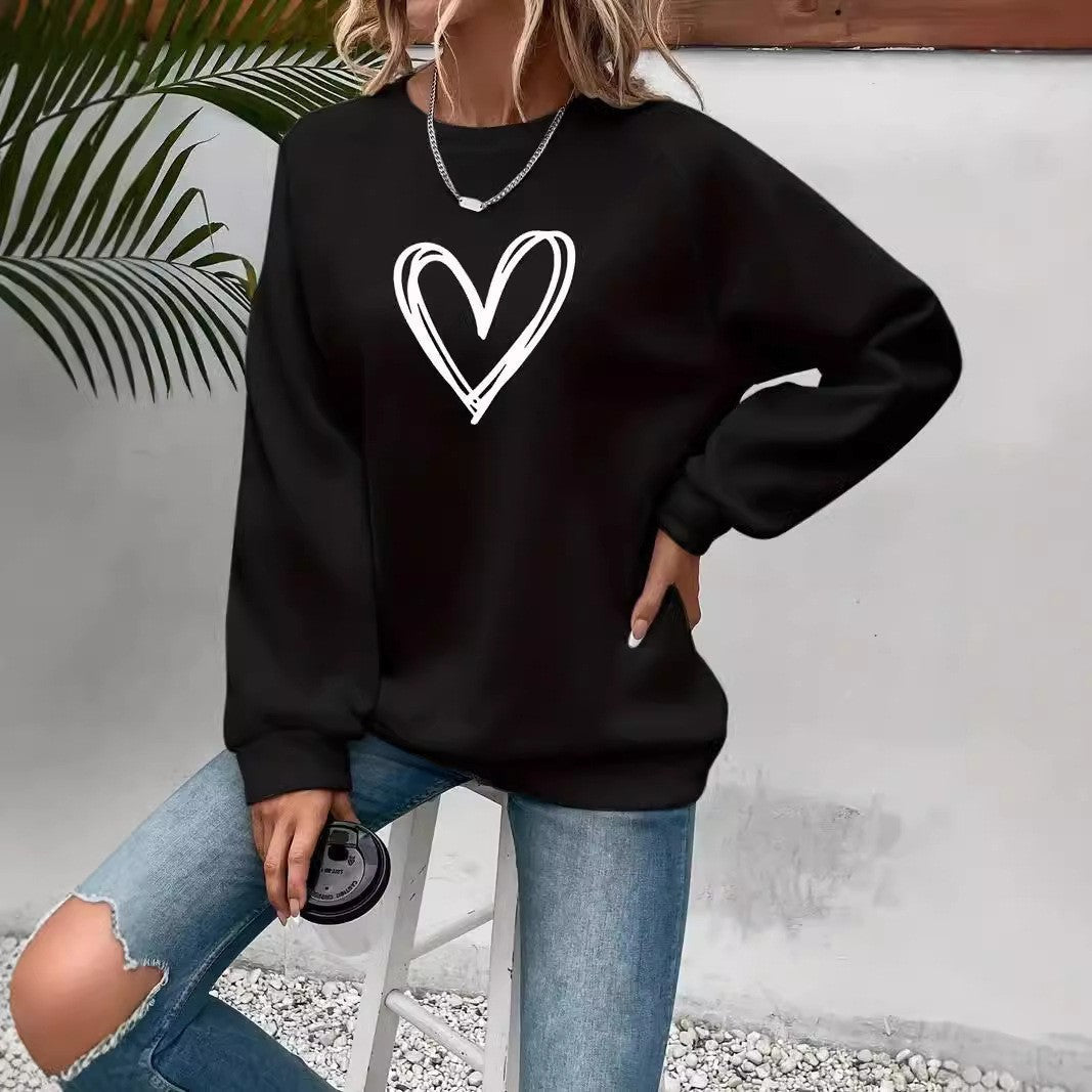 Women's pink crew neck sweatshirt long sleeve with cute heart print cozy everyday comfort fit