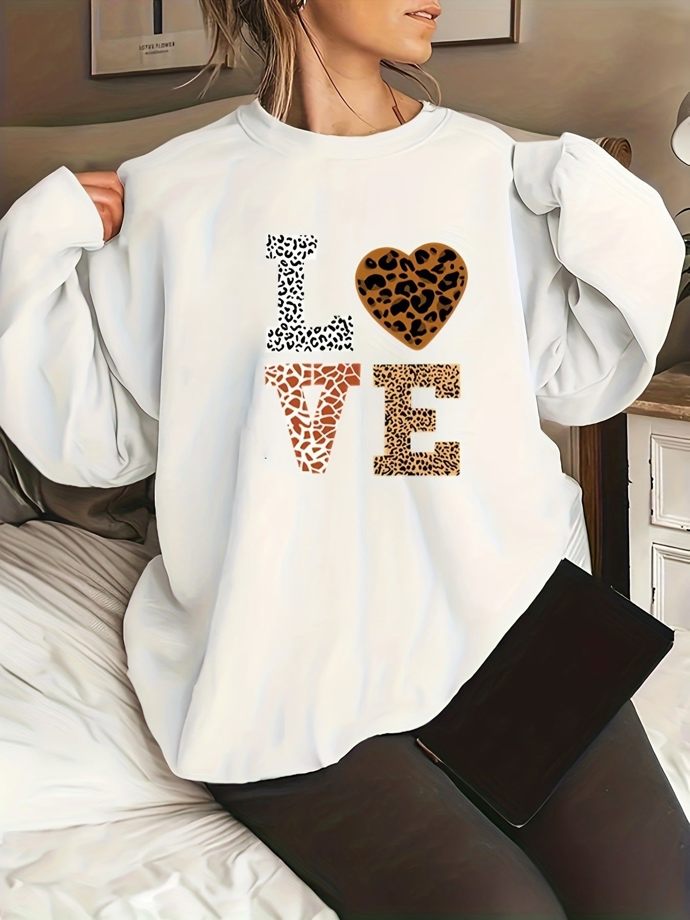 Women's leopard print crew neck knit sweater, chic versatile everyday knitwear with bold animal pattern