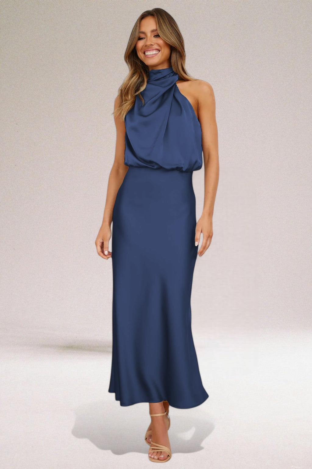 Women's black satin halter dress with elegant silhouette and luxurious sheen for eveningwear