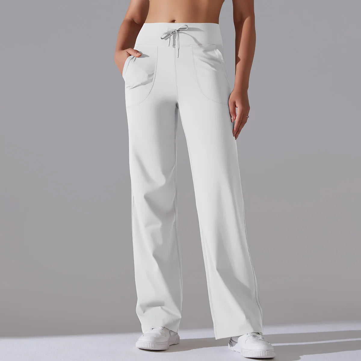 Women's straight-leg yoga pants with contoured waistband, ultra-soft 4-way stretch fabric and deep pockets