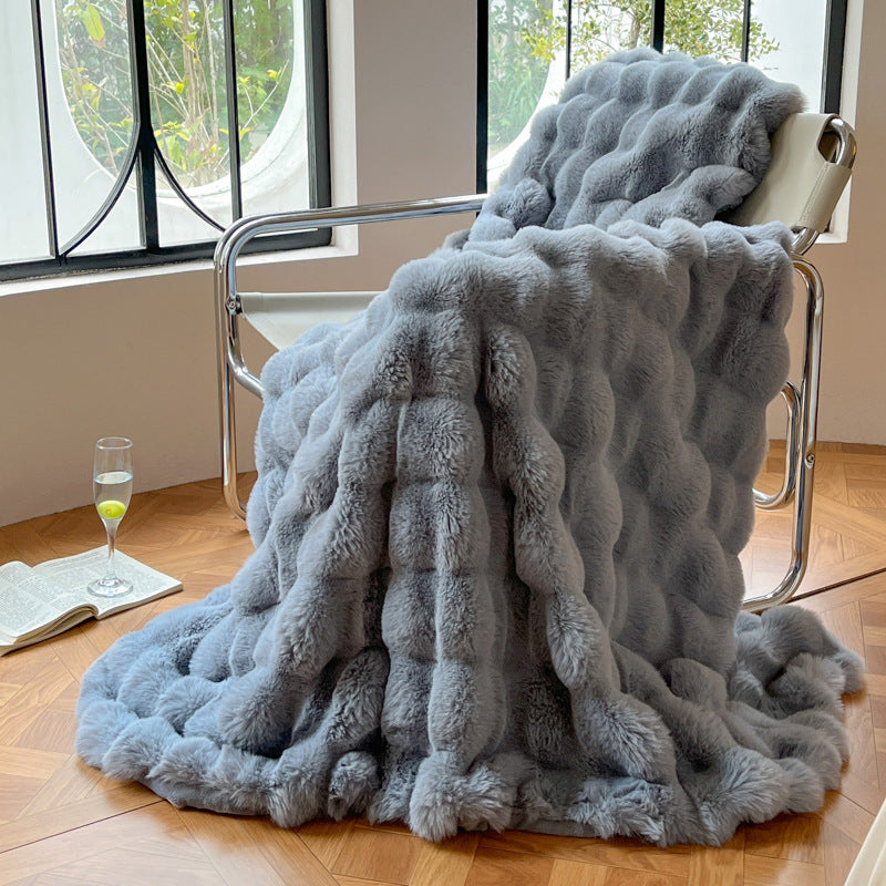Beige faux fur throw blanket ultra-plush cloudlike texture cozy luxury contemporary home decor