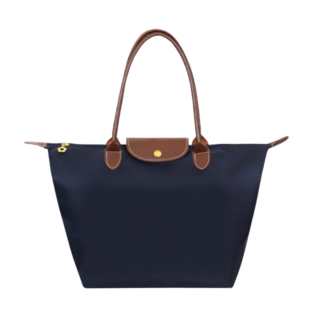 Luxury women's handbag with top handles, timeless elegant design and premium craftsmanship