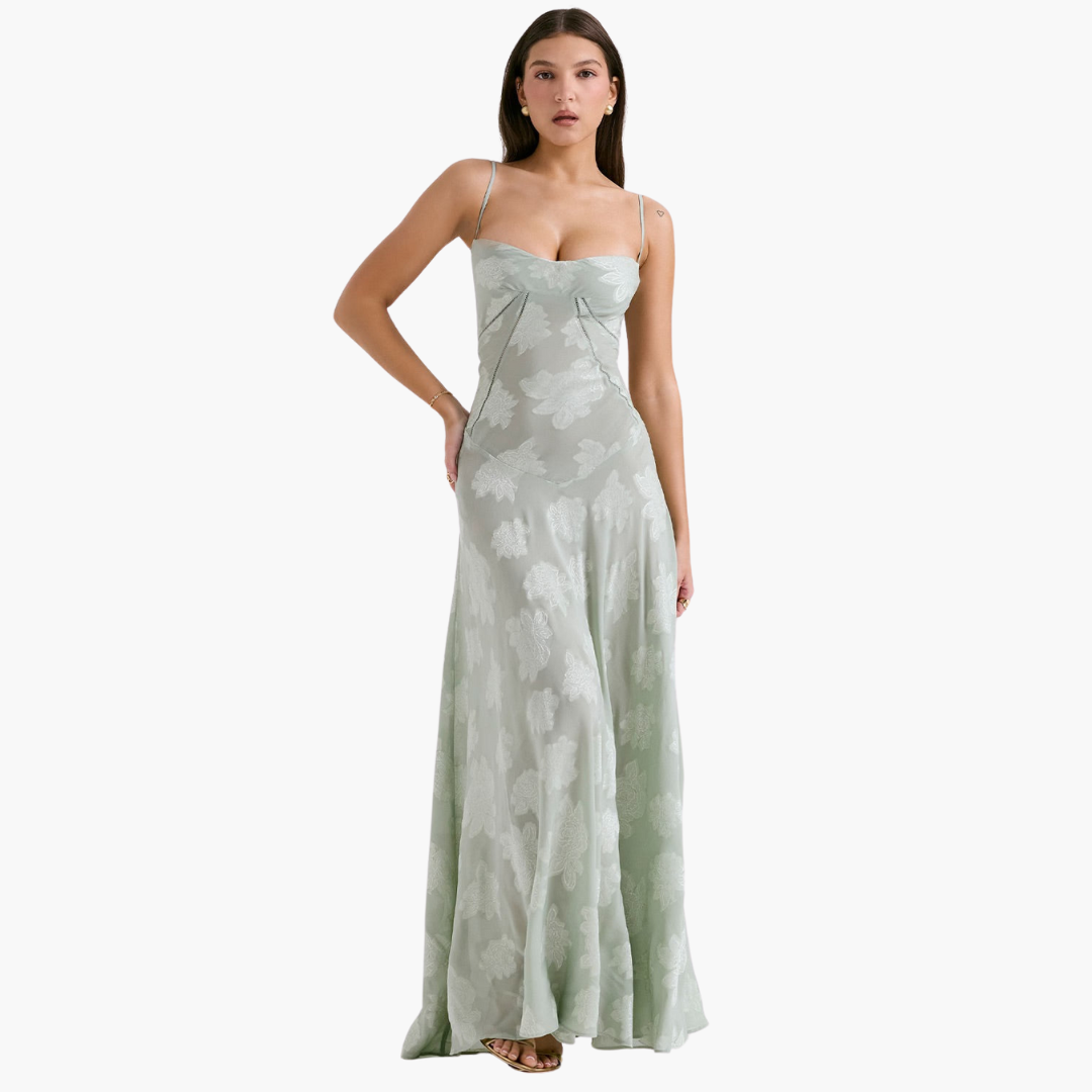 Women's ivory vintage lace gown with beaded details and flowing feminine silhouette for special occasions