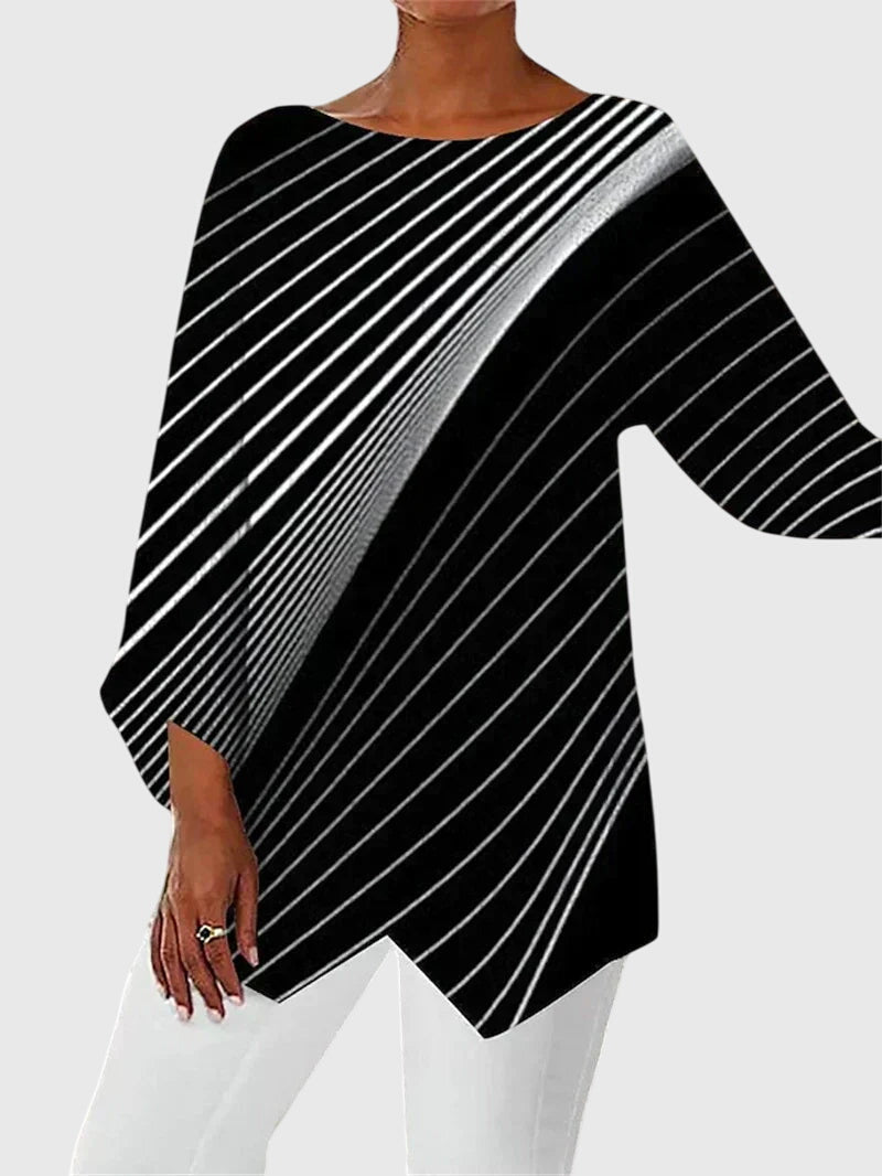 Women's flowing blouse with sparkle detail accents in a relaxed modern silhouette for radiant everyday style