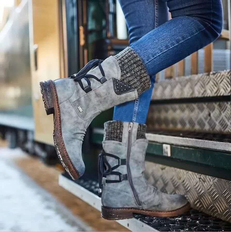 Women's purple leather insulated ankle boots with cozy knit trim detail for winter style