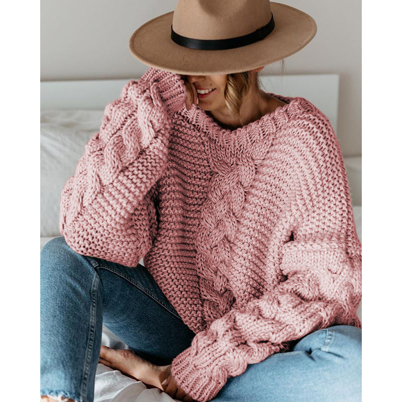 Oversized chunky cable knit sweater in cozy neutral tones with thick textured artisanal detailing