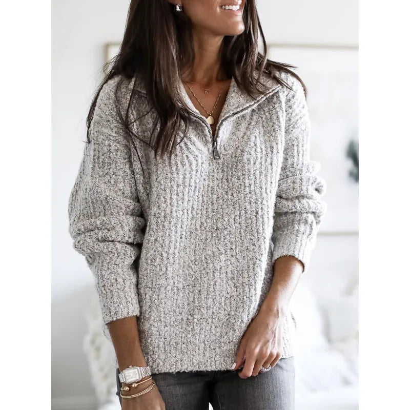 Women's teal knit sweater with cozy relaxed fit and premium soft wool fabric for everyday elegance