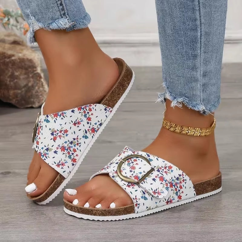 Women's buckle mule slide in neutral suede-like finish with contoured footbed for all-day comfort