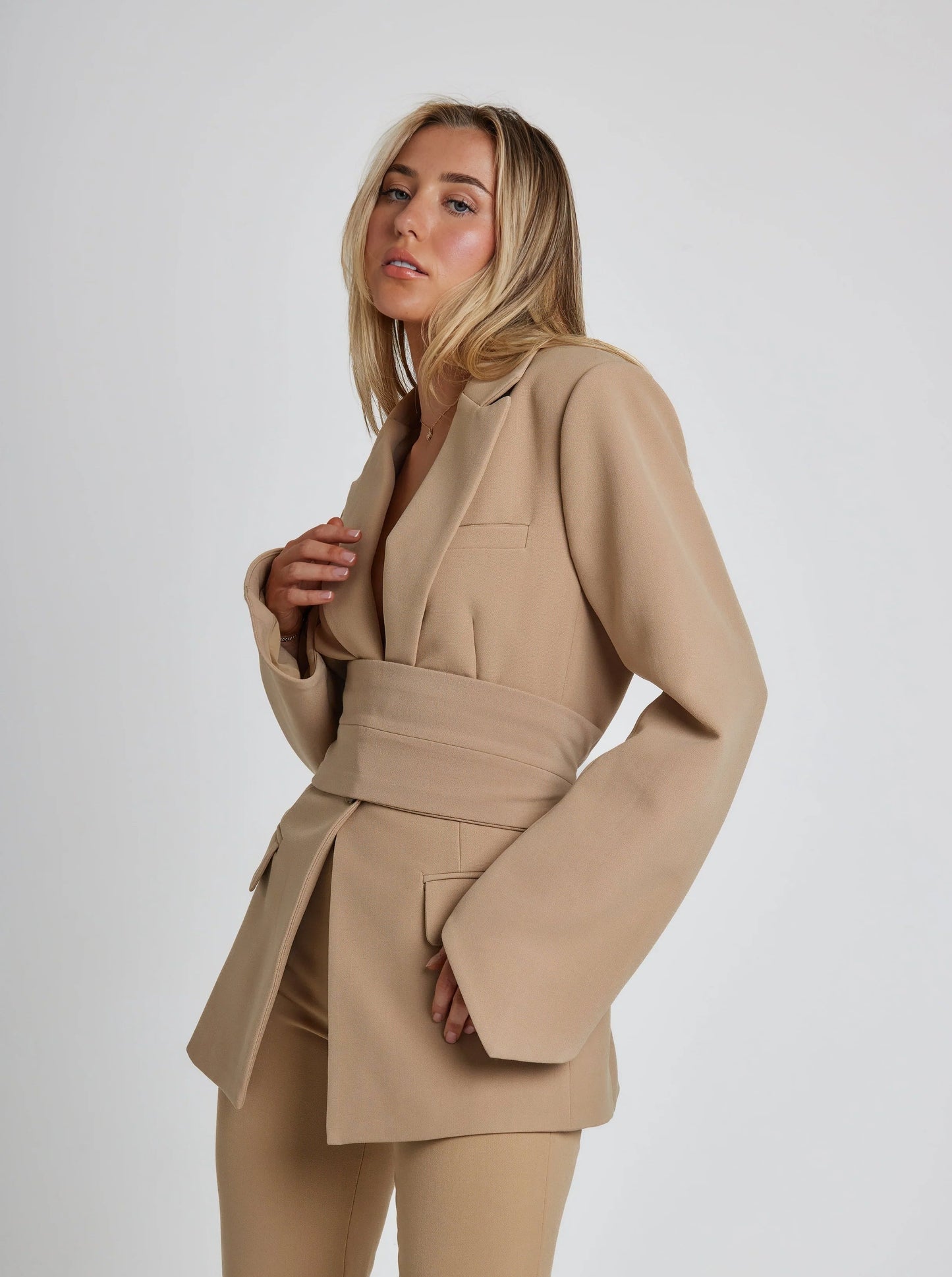 Women's slim tailored blazer with waist belt, elegant office-to-evening versatile fit